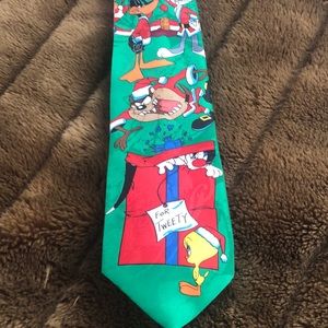 Looney Tunes men’s tie. Features favorite characters in a Christmas motif.